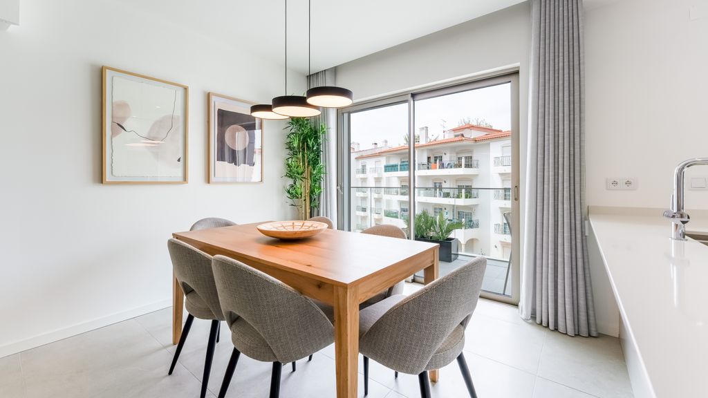 Modern 2BR w/ Rooftop Pool & Parking by LovelyStay