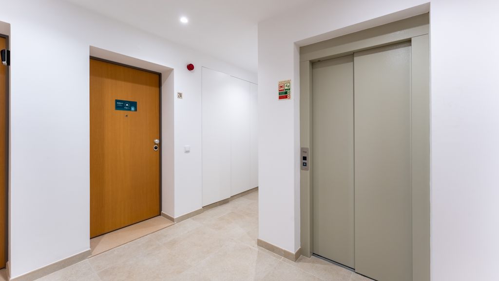 Modern 2BR w/ Rooftop Pool & Parking by LovelyStay