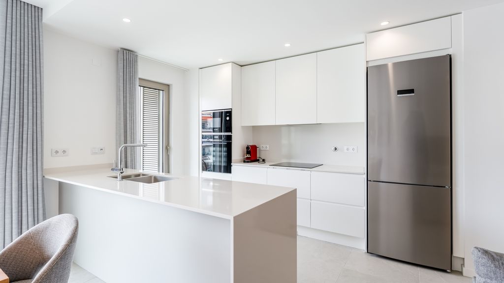 Modern 2BR w/ Rooftop Pool & Parking by LovelyStay