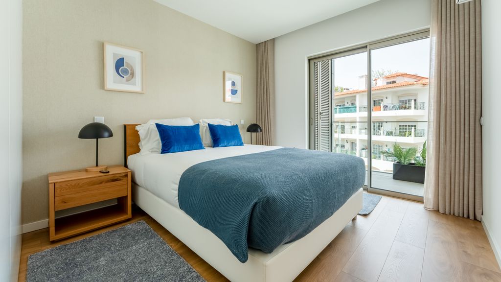 Modern 2BR w/ Rooftop Pool & Parking by LovelyStay