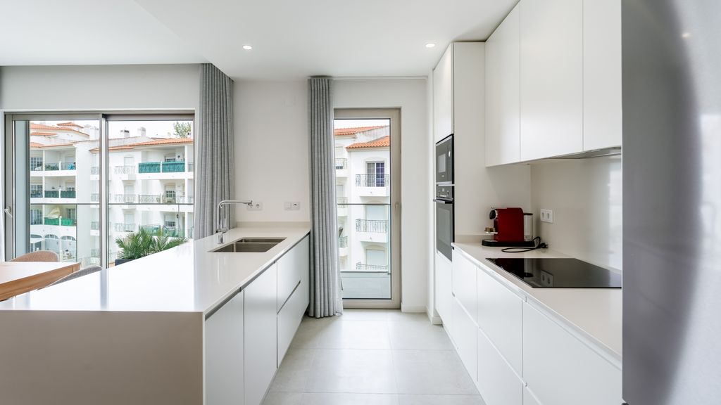 Modern 2BR w/ Rooftop Pool & Parking by LovelyStay