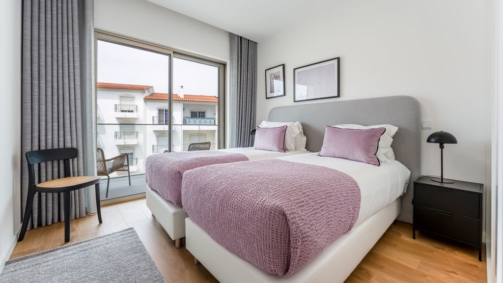 Modern 2BR w/ Rooftop Pool & Parking by LovelyStay