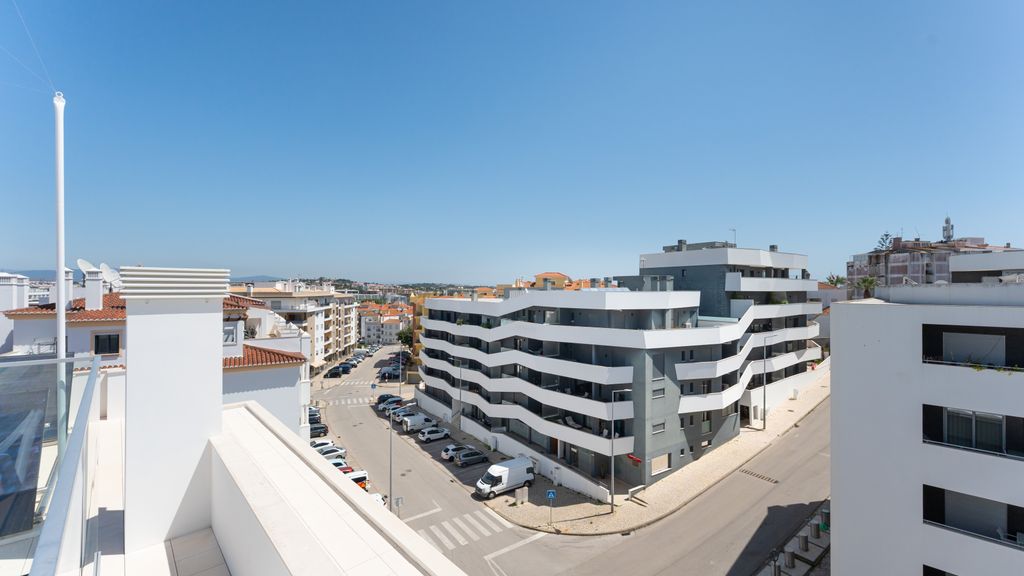 Modern 2BR w/ Rooftop Pool & Parking by LovelyStay