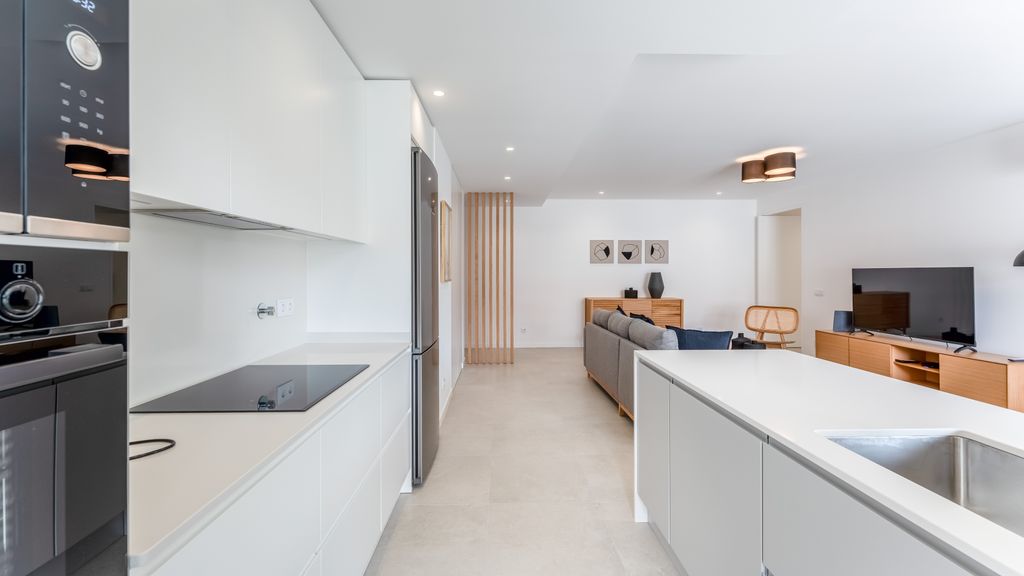 Modern 2BR w/ Rooftop Pool & Parking by LovelyStay