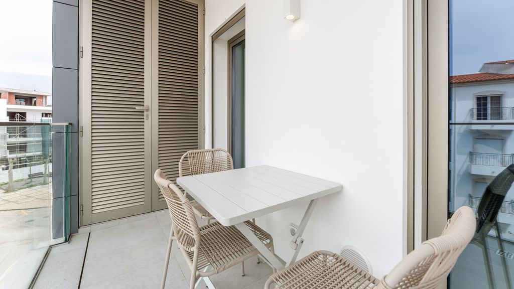 Modern 2BR w/ Rooftop Pool & Parking by LovelyStay