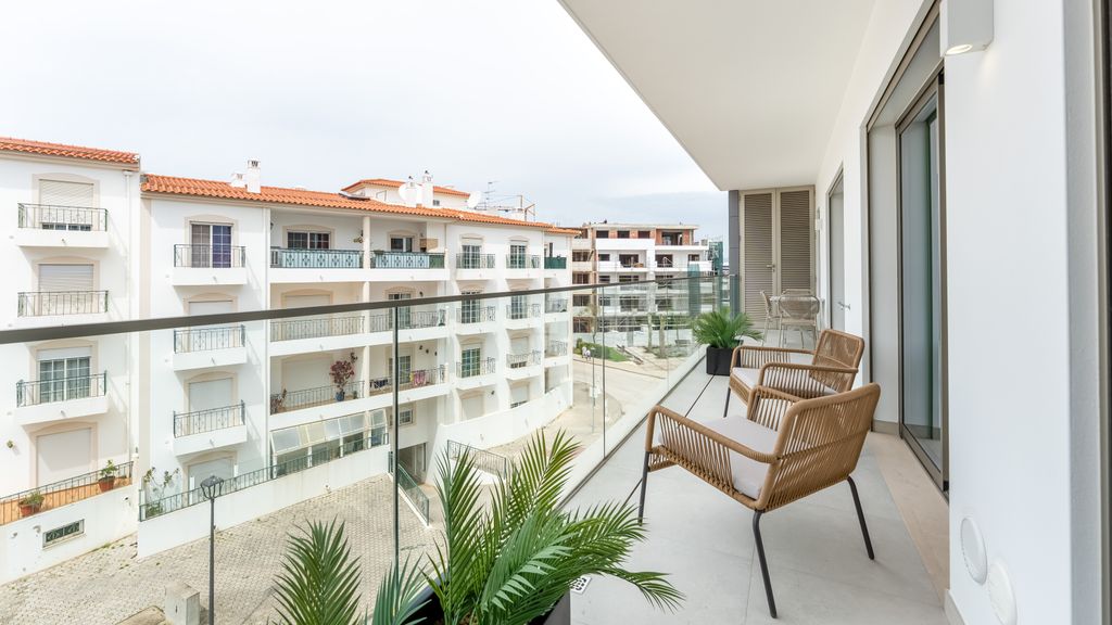 Modern 2BR w/ Rooftop Pool & Parking by LovelyStay