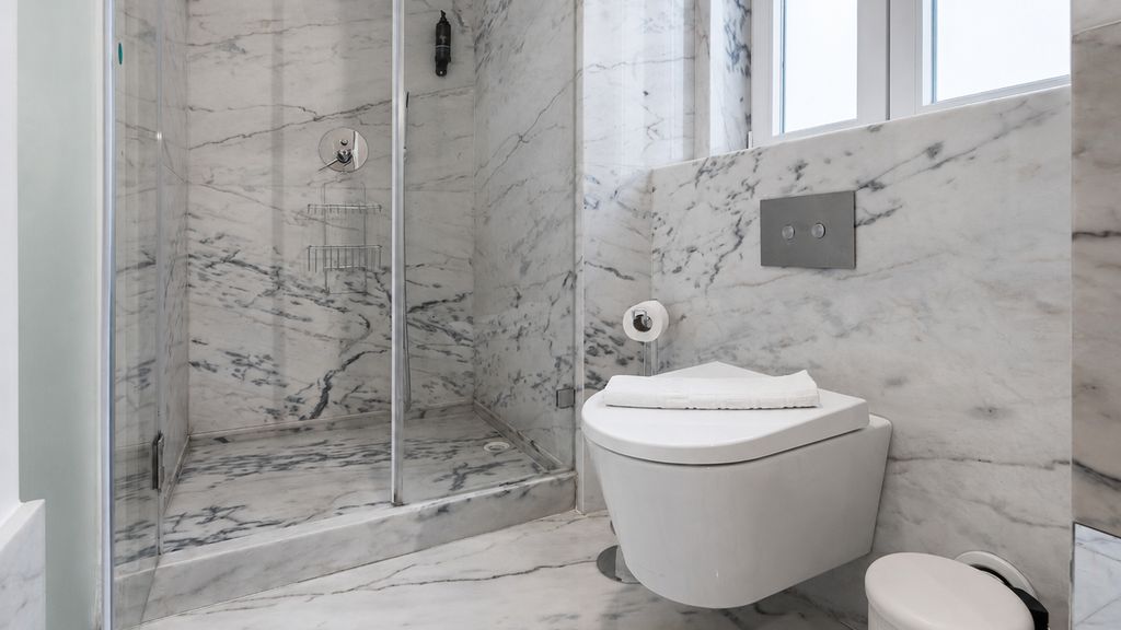 Wood and Marble 1BDR Apartment by LovelyStay