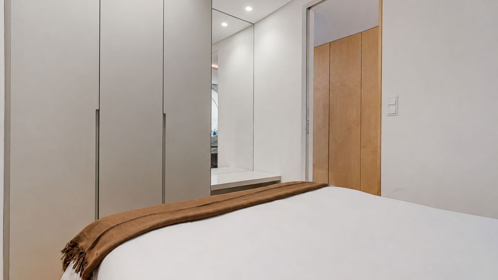 Wood and Marble 1BDR Apartment by LovelyStay