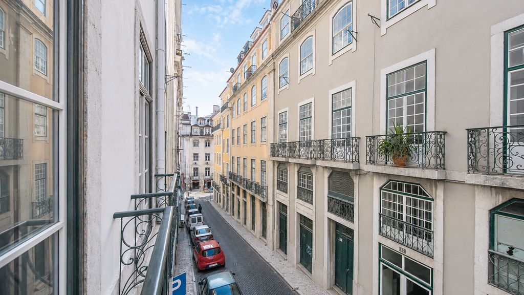 Charming Baixa 3BR with Balcony by LovelyStay