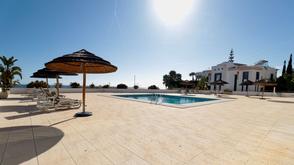 Olhos D' Água 1BR W/Pool & Parking by LovelyStay