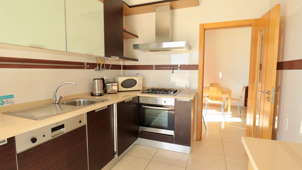 Olhos D' Água 1BR W/Pool & Parking by LovelyStay